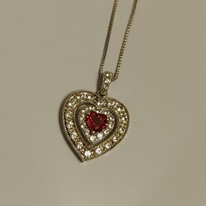 Garnet and diamond heart shape necklace